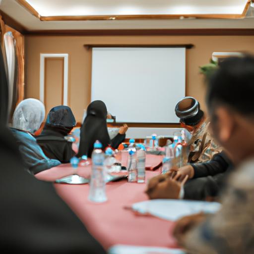 Một nhóm người ngồi trong phòng họp thảo luận về các vấn đề liên quan đến province